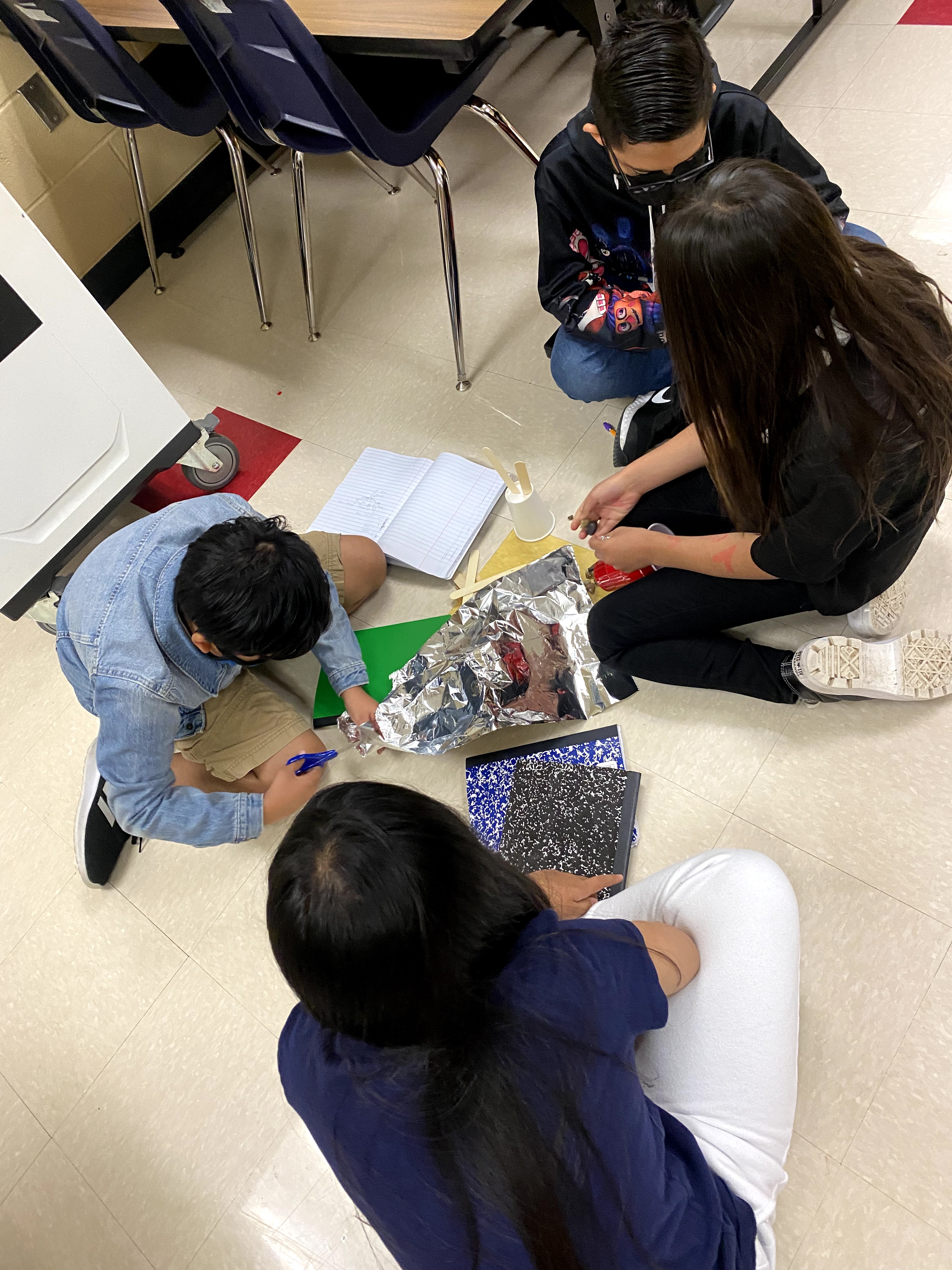 Students playing with Legos