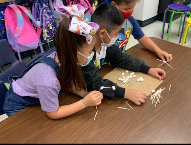 image of students working together on a project