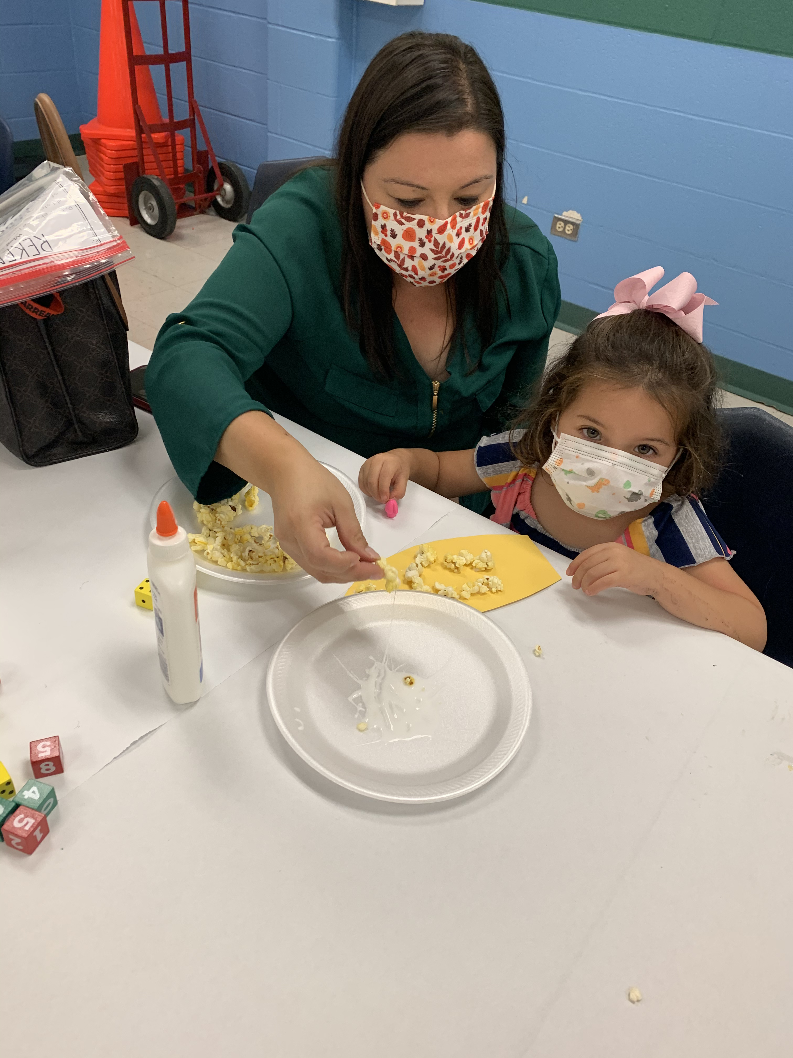 Mother and daughter playing Math game.