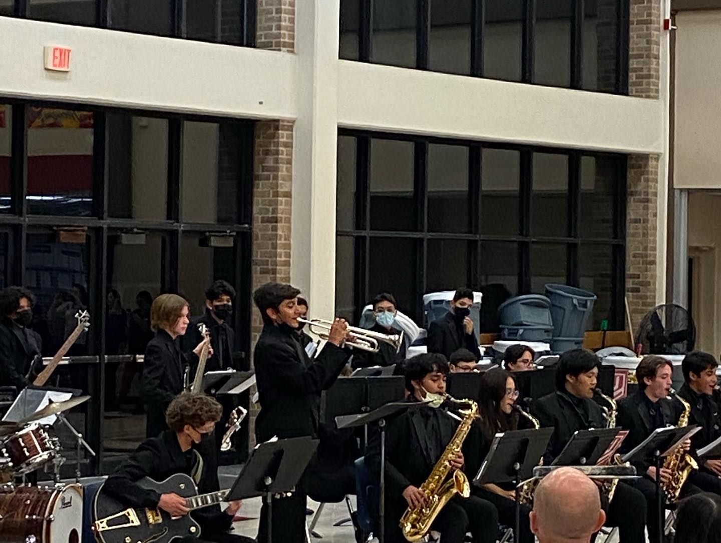 Taft band student performing in cafeteria for themed Italian dinner night