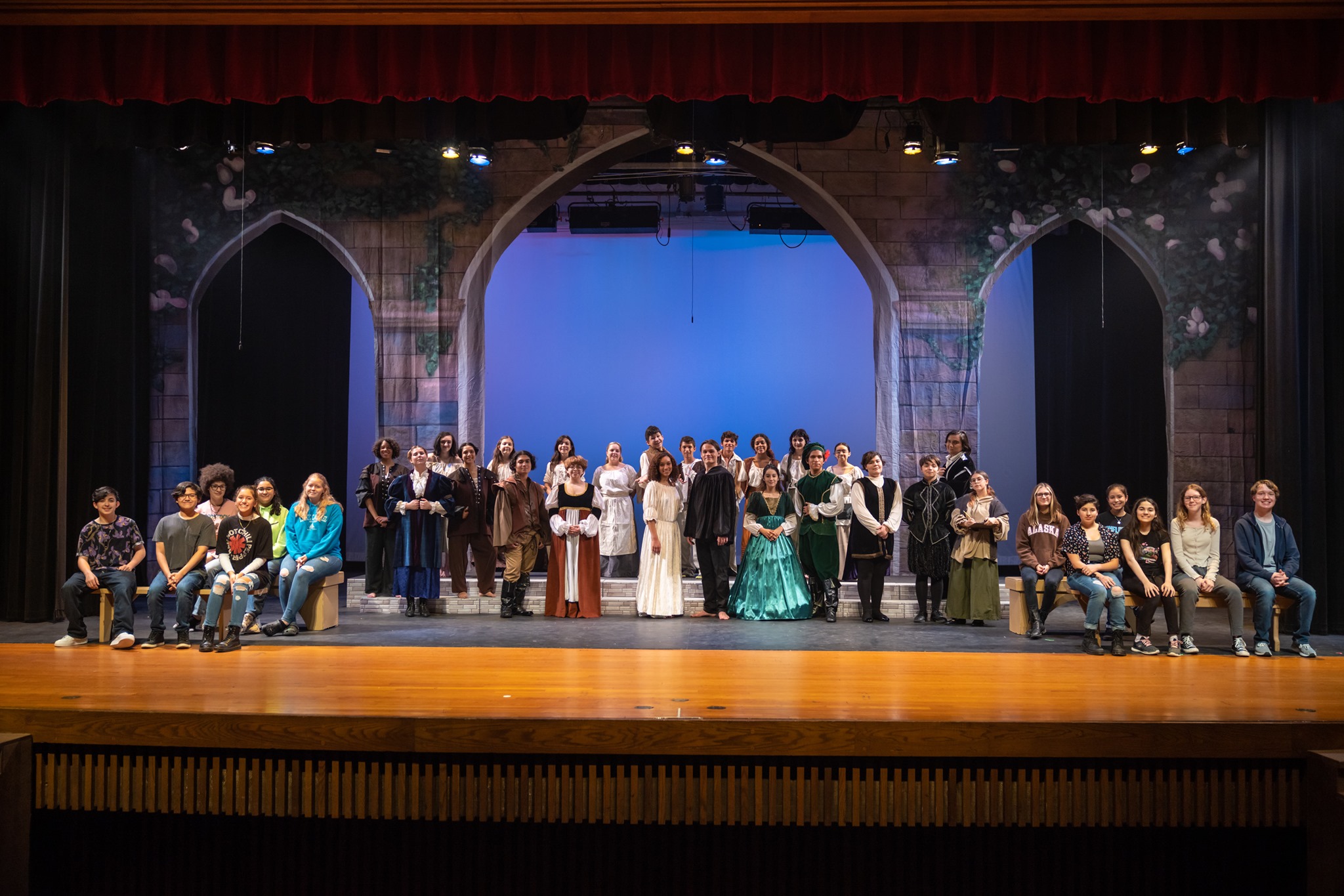 Taft theater students and crew posing on auditorium stage for all cast pic