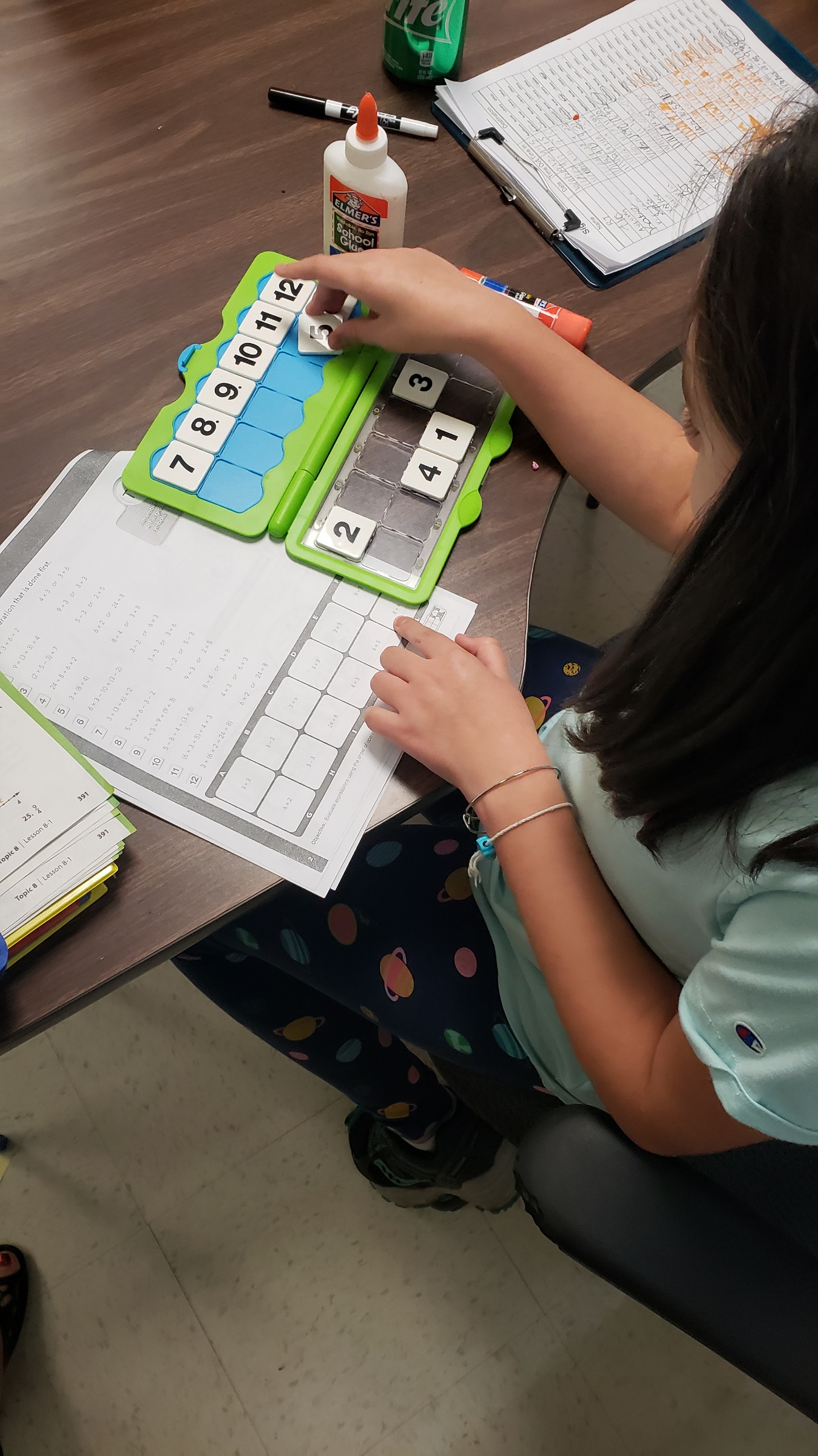 Students doing math problems.