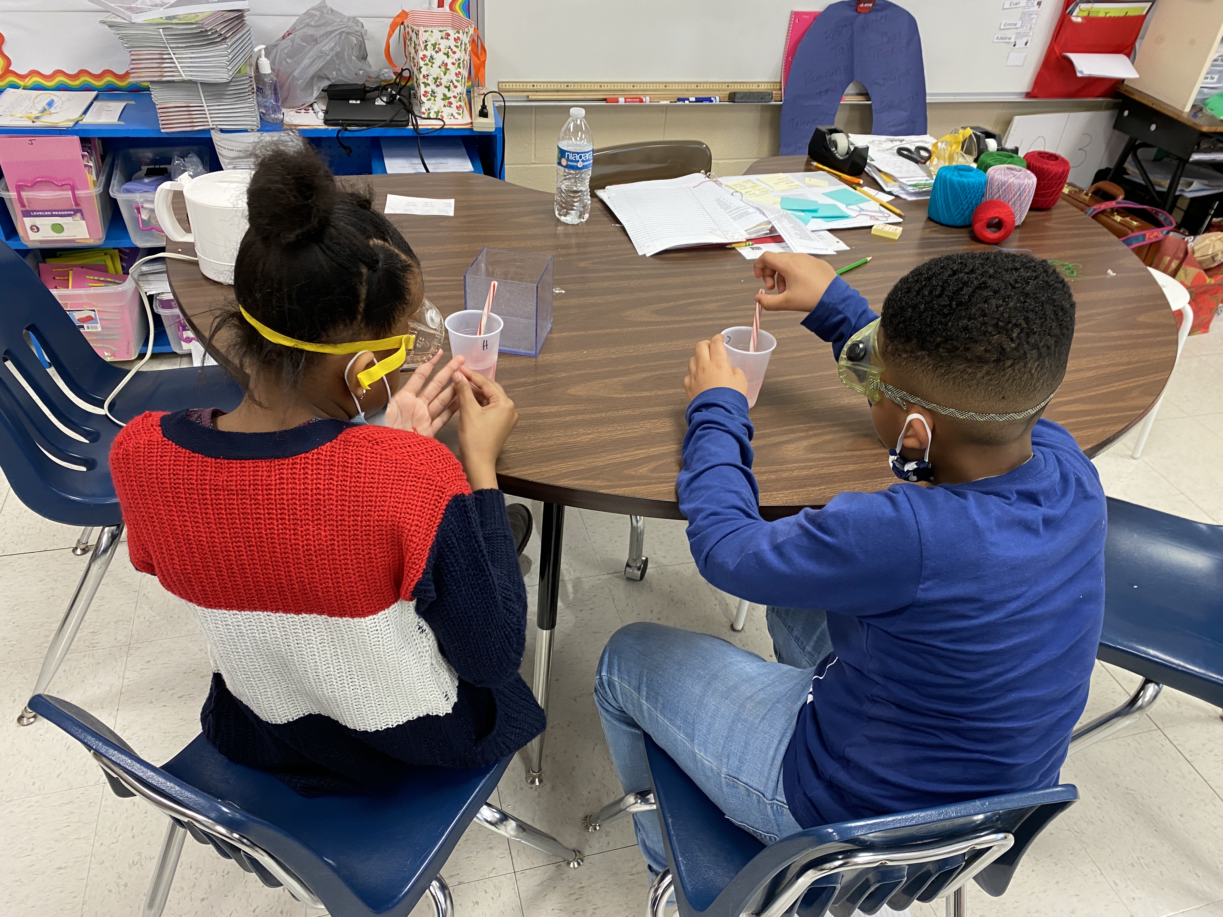 Students doing a Science experiment. 