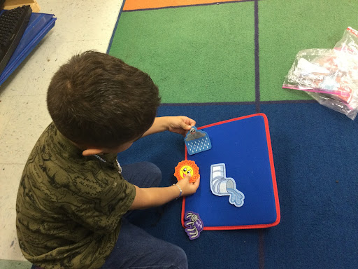 Kinder Student playing