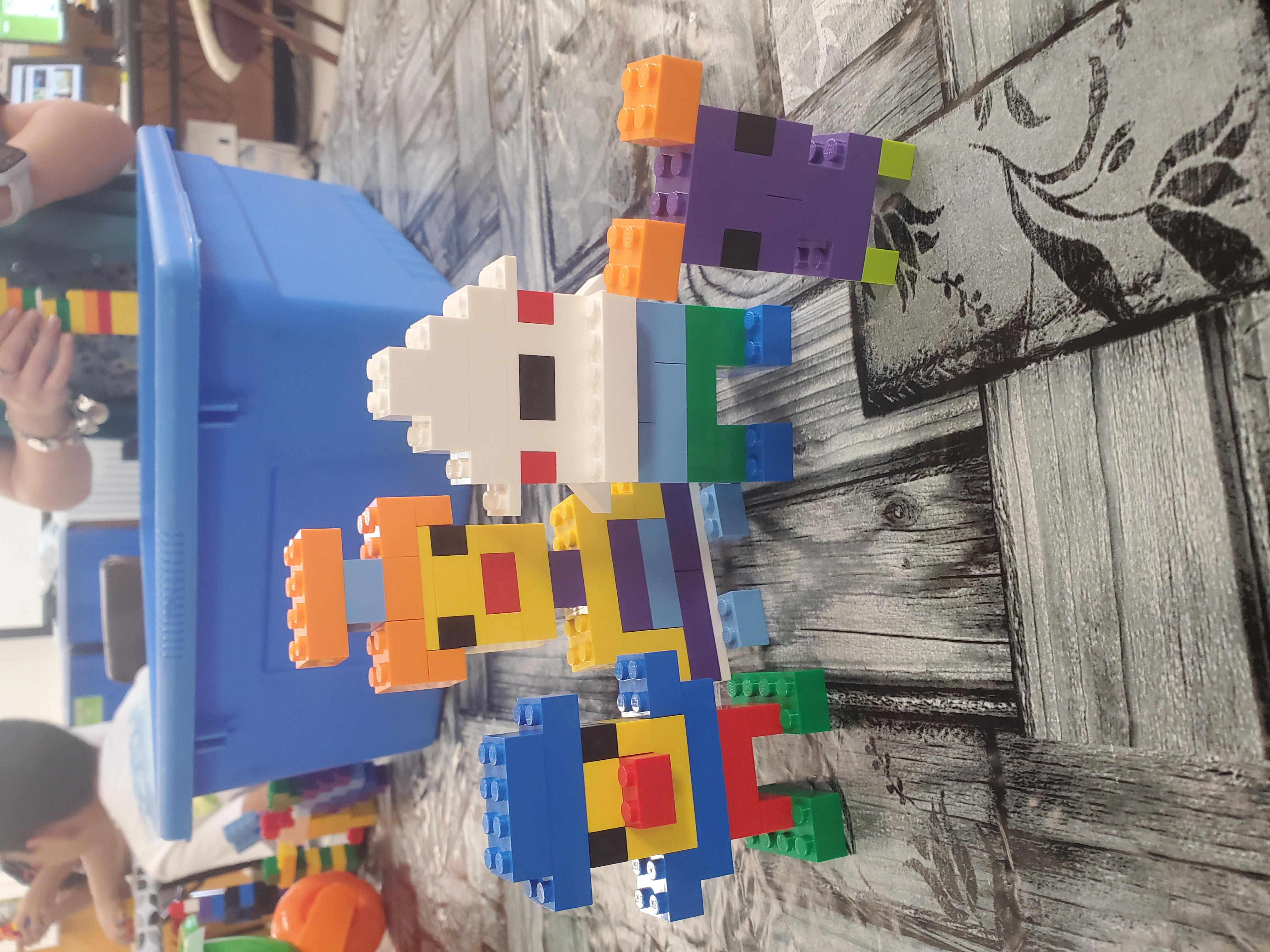 Students building with Legos
