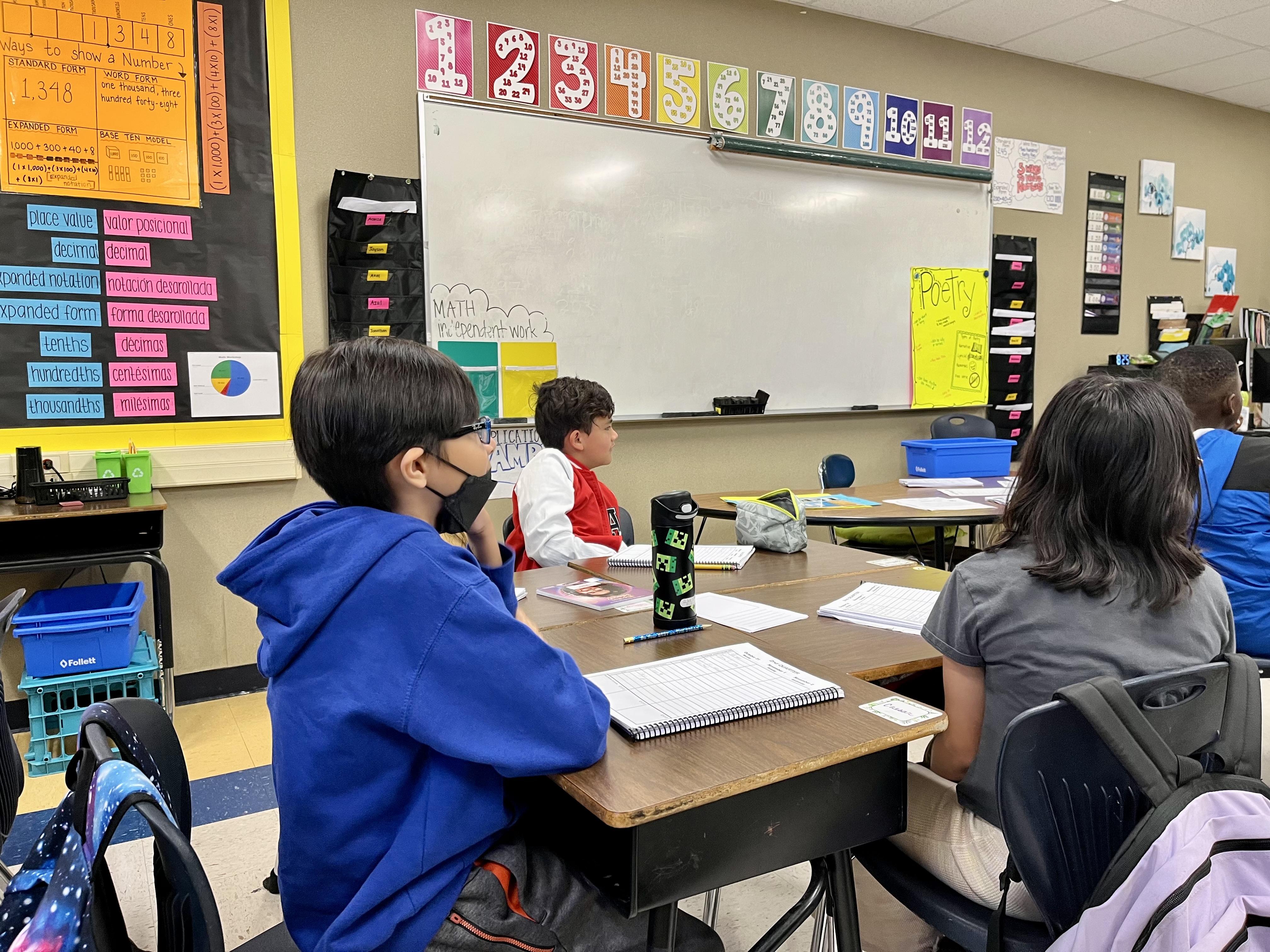 Student listening to their teacher