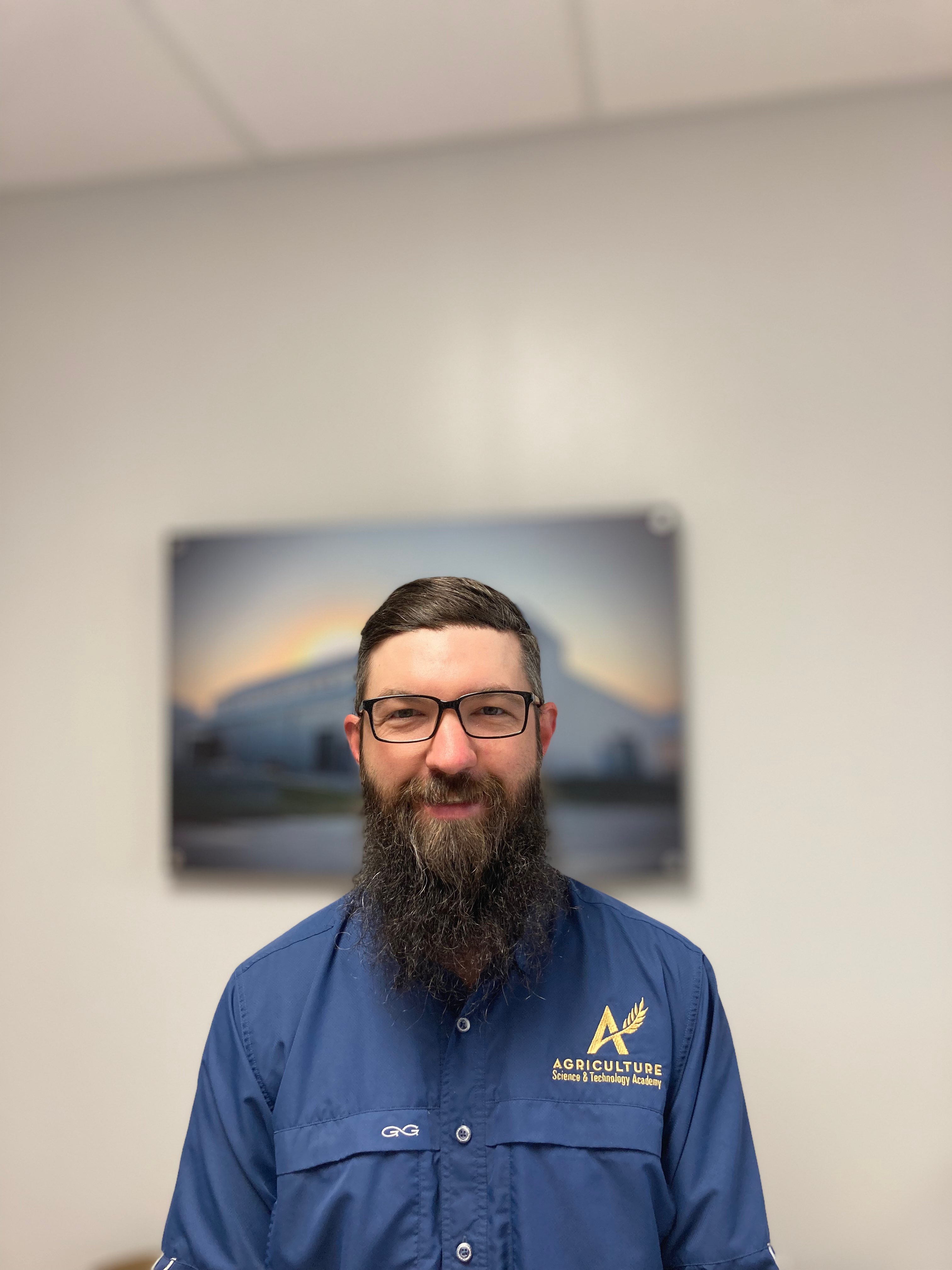 Mr.McFarland in a blue shirt