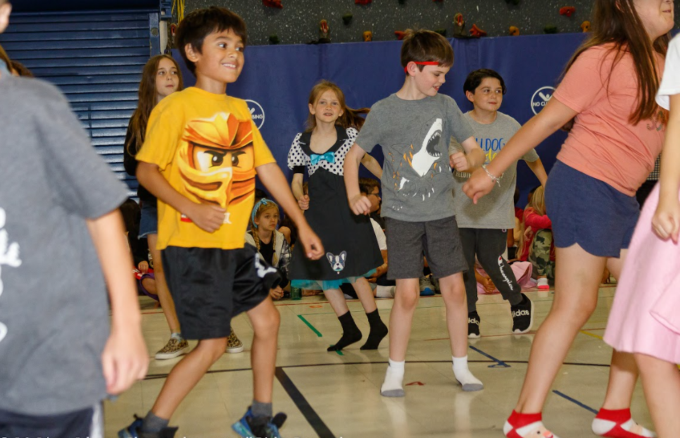 Students participating in Helotes Elementary Sock Hop