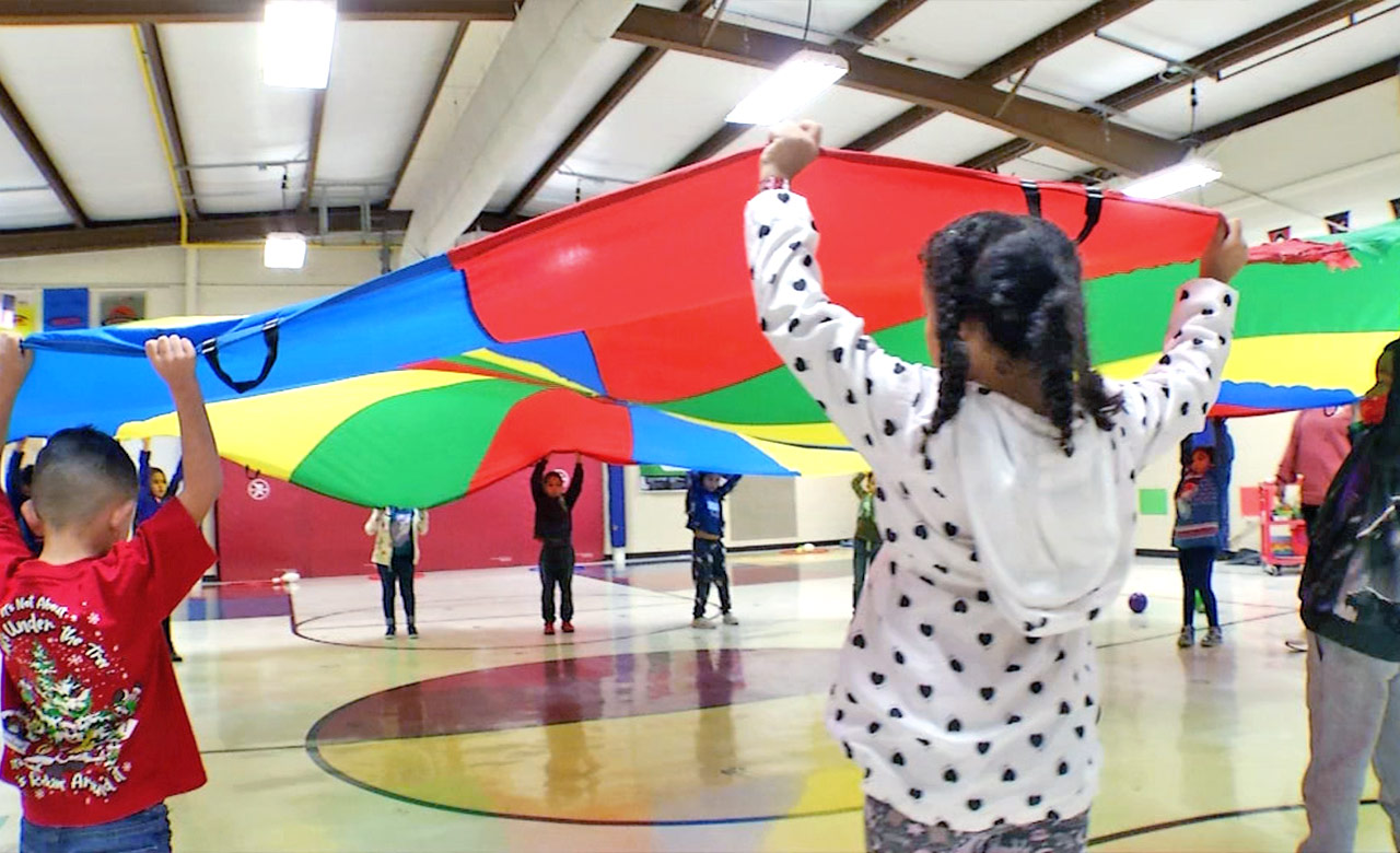 NISD Students playing in the gym.
