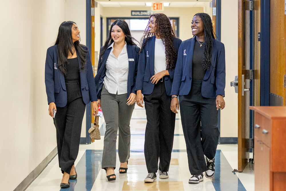 Student ambassadors walking in the hallway
