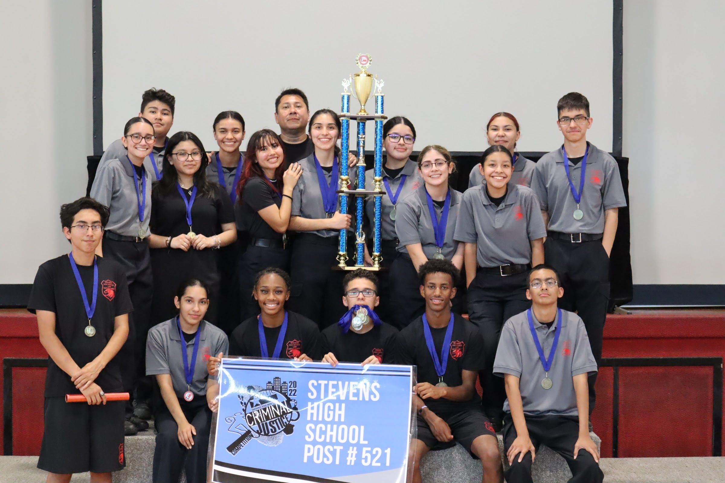 Stevens Law Enforcement Class Receiving a Trophy