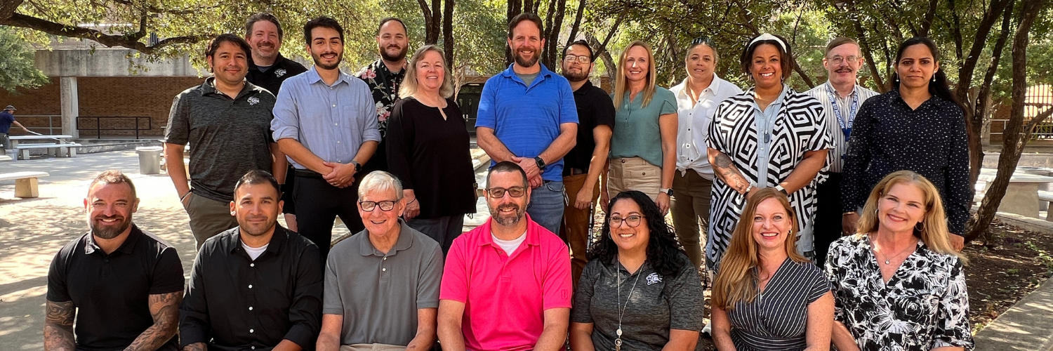 Group photo of the 2025-2026 Math department outside in the Clark Courtyard