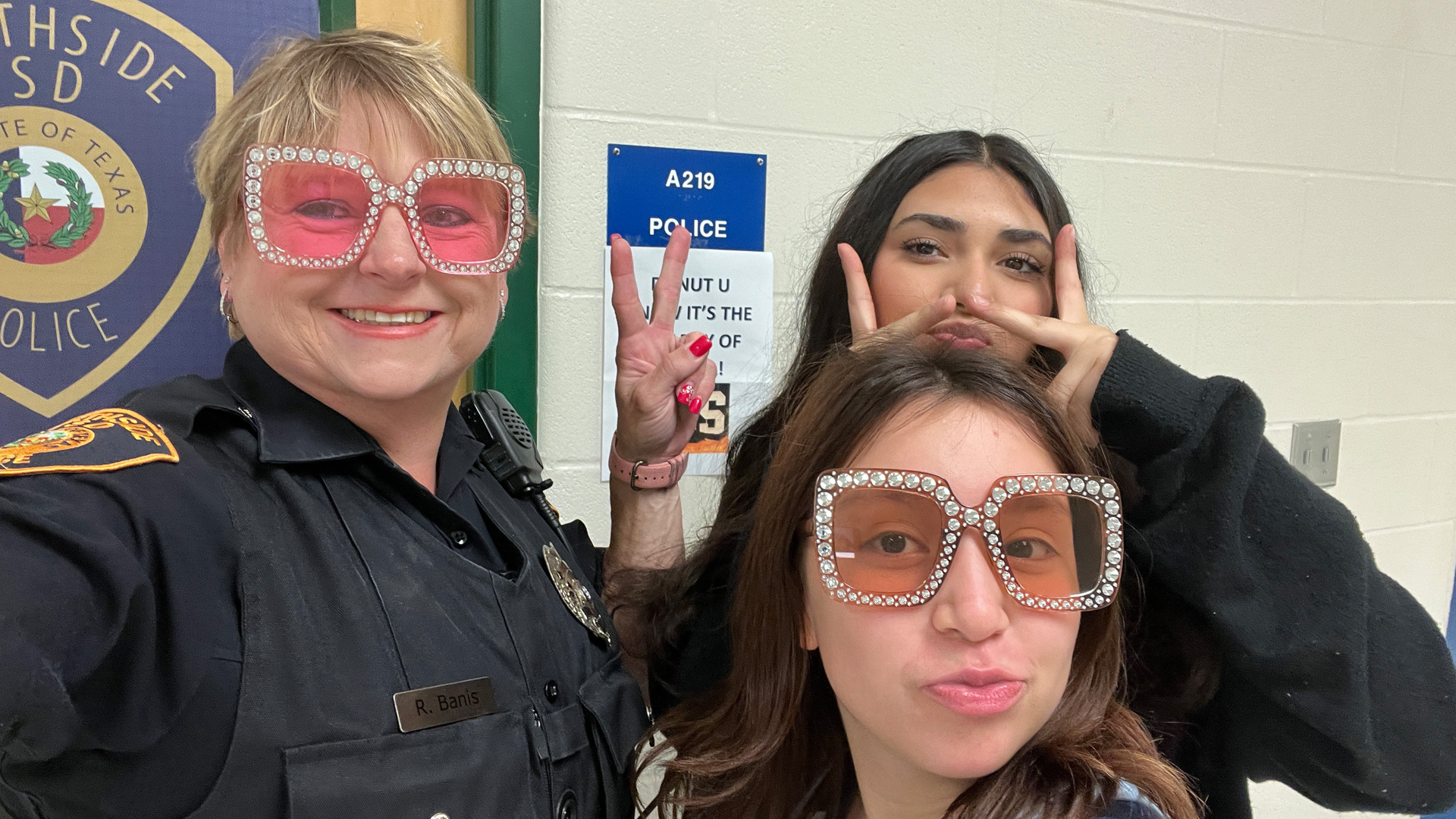 Officer with students