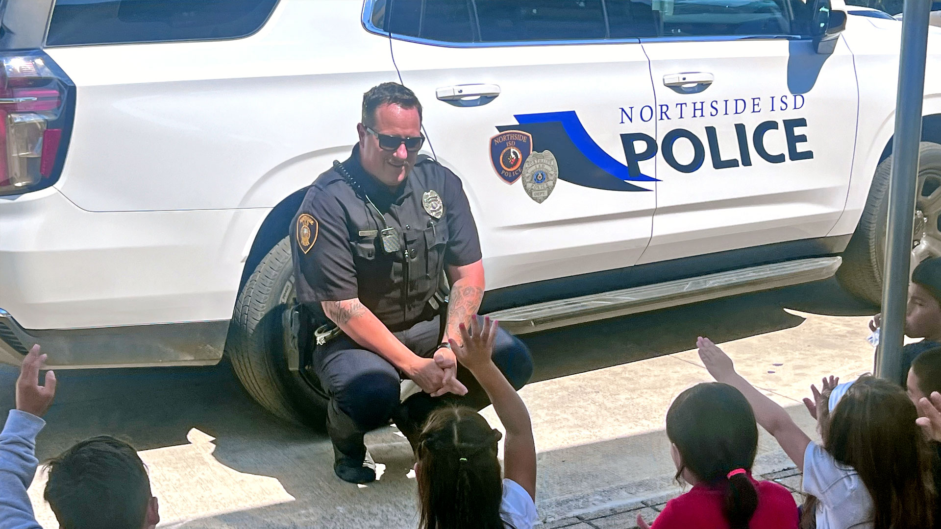 Officer visiting students