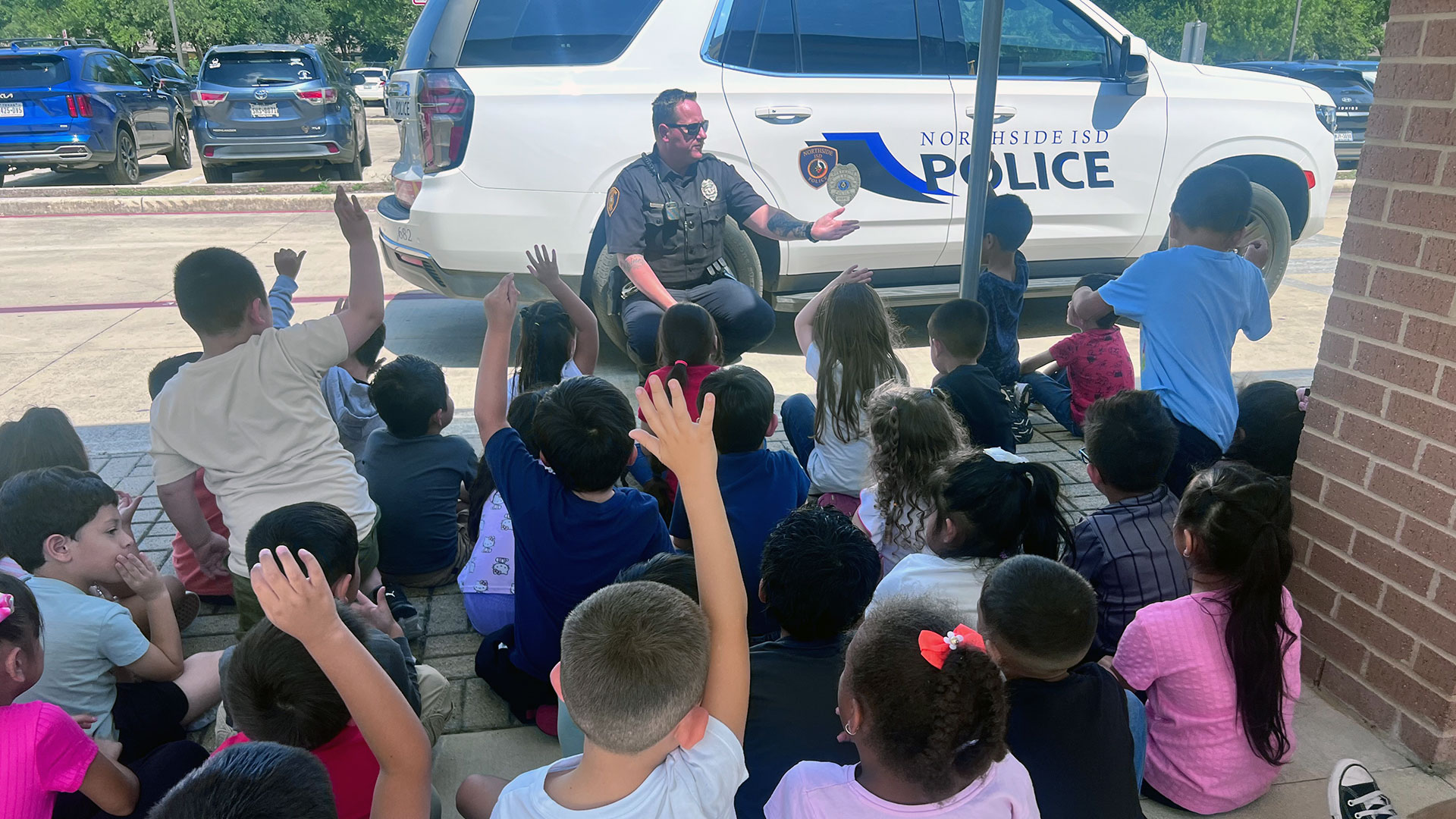 Officer visiting students