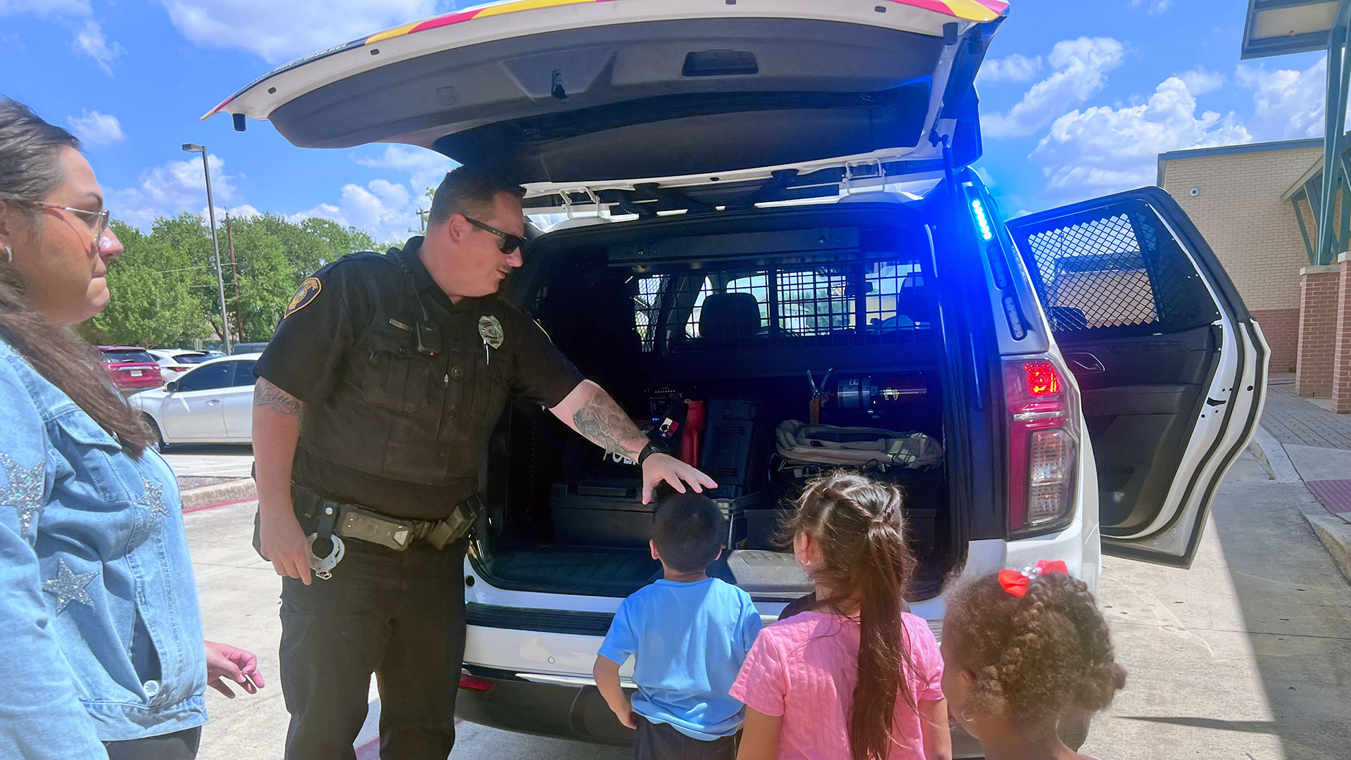 Officer visiting students