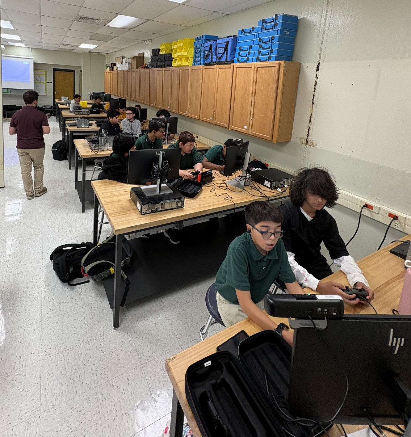 students playing in classroom with nintendo switch. 