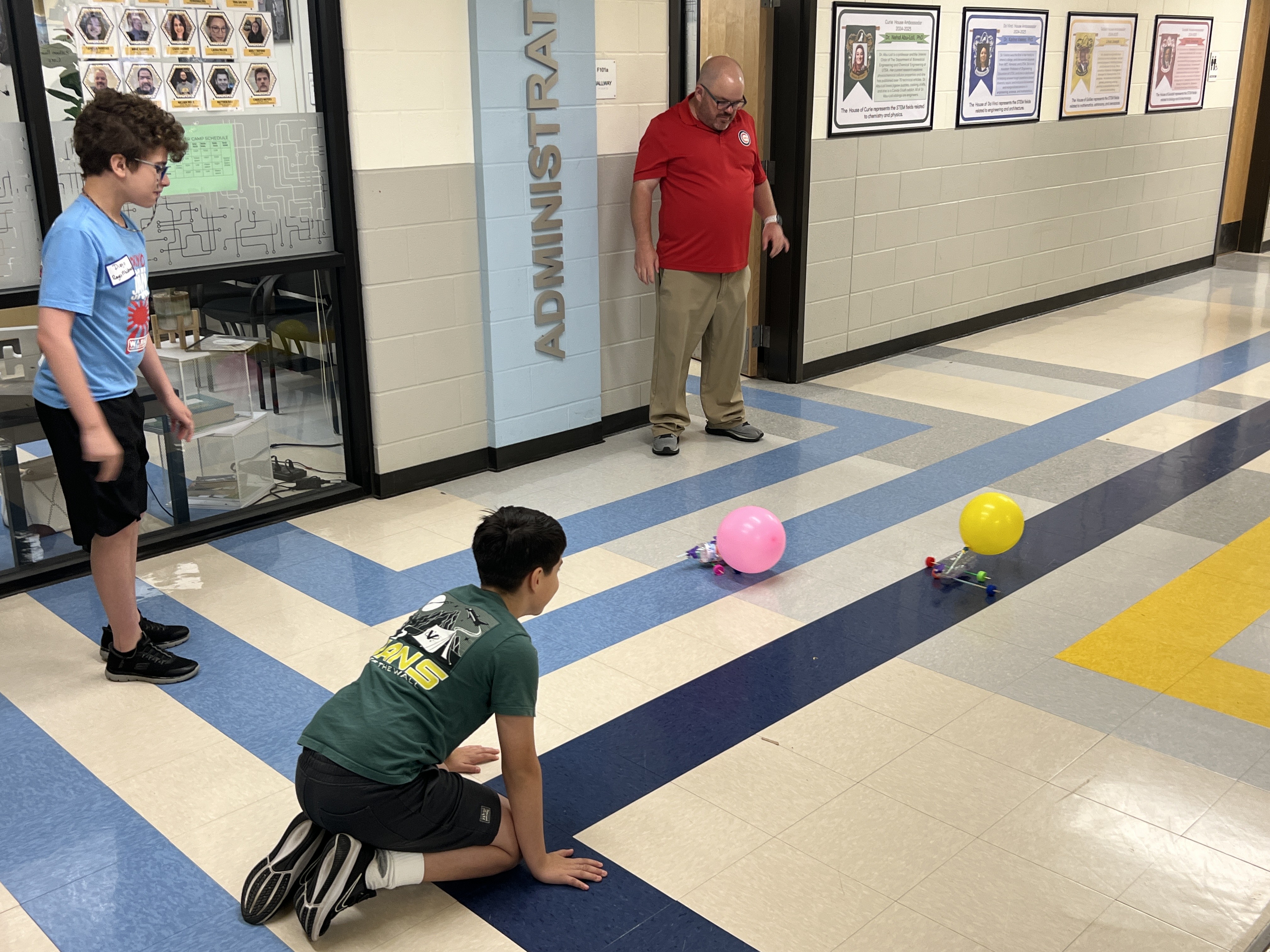 Students racing balloon cars