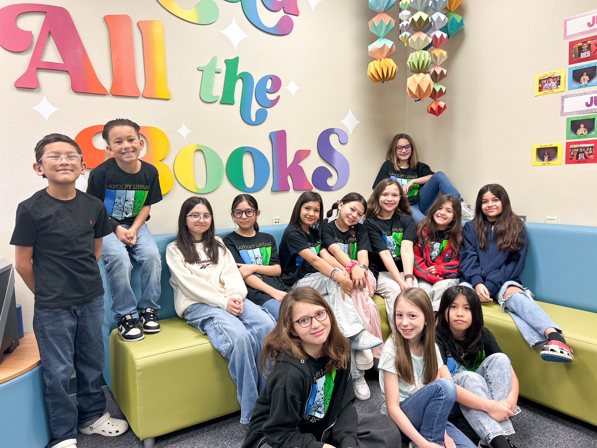Langley Library Crew 4th and 5th graders lounging in the library.