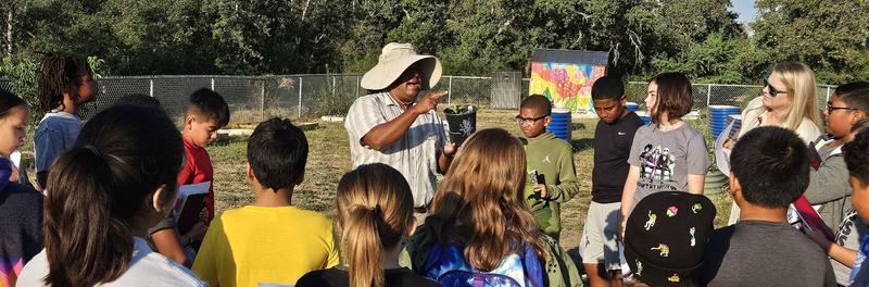 Students learning with Isaac Esquivel, Environmental Science Teacher 