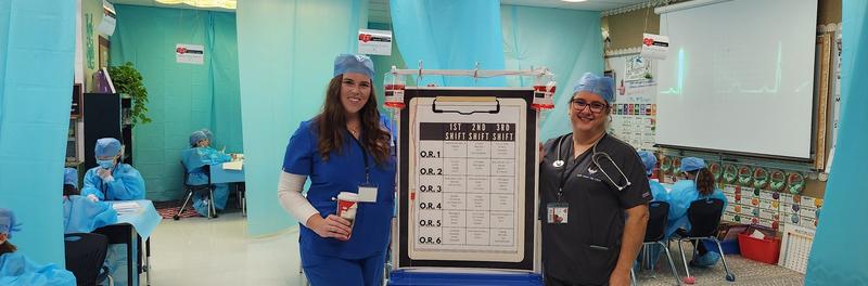 Teachers and students in a classroom dressed as doctors