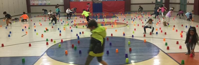 children playing in a school gym
