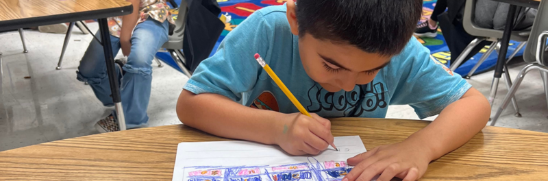 McDermott student working on his handwriting