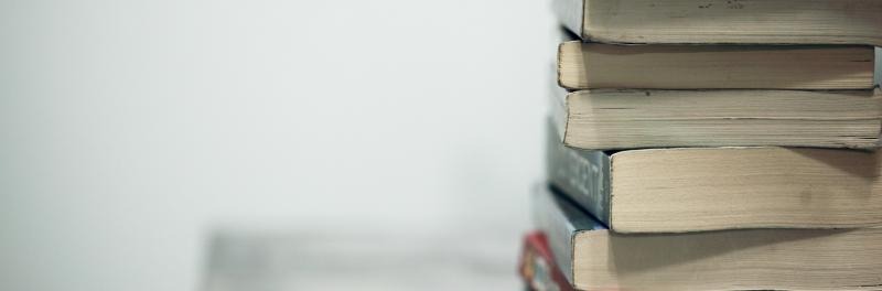 Books on a table. Photo by Sharon McCutcheon on Unsplash