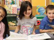 Students smiling at camera