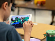 Student on his classroom device