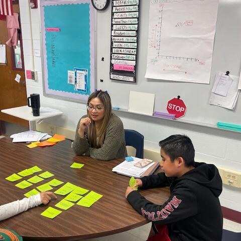 students learning with teacher