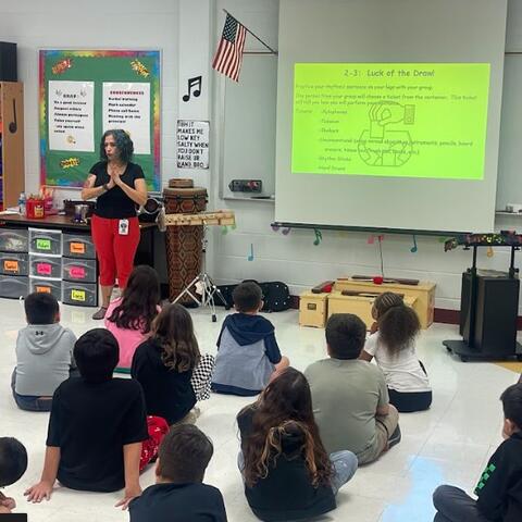 Music teacher and students