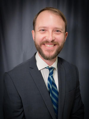 Portrait image of Associate Principal, Christopher Sandrin