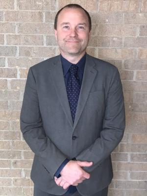 Portrait of Greg Dylla, The Vice Principal of Hobby