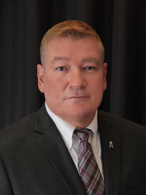 Admin intern, Lawrence Beebe, posing for a professional portrait