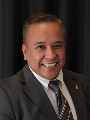 Mr. Villalobos smiling