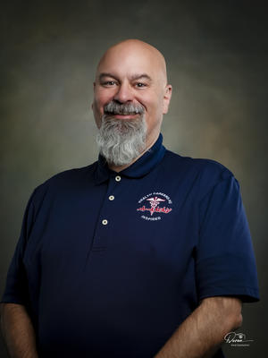 portrait photo of Principal, Jay Sumpter