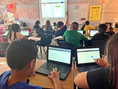 Students on their computers in class