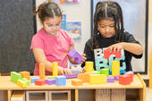 Students building with blocks