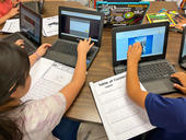 Elementary students on their devices in the classroom